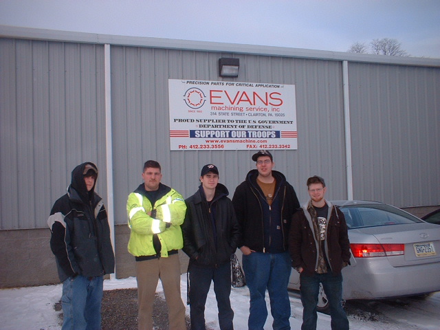 Students visiting Evens Machining Service for a field trip 